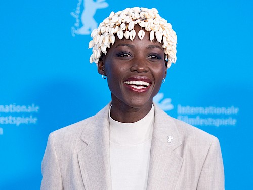 Lupita Nyong'o Wore a Cowrie Shells Headpiece To The Berlinale International Jury Photocall. Here is Why This is Significant.