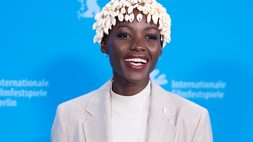 Lupita Nyong'o Wore a Cowrie Shells Headpiece To The Berlinale International Jury Photocall. Here is Why This is Significant.